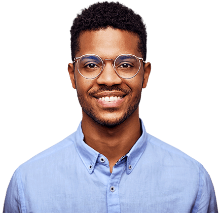 Young black man wearing glasses and blue dress shirt smiling
