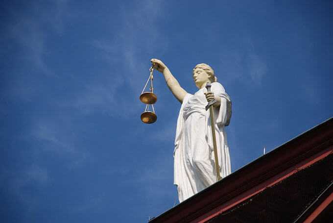 Looking up at Lady of Justice statue