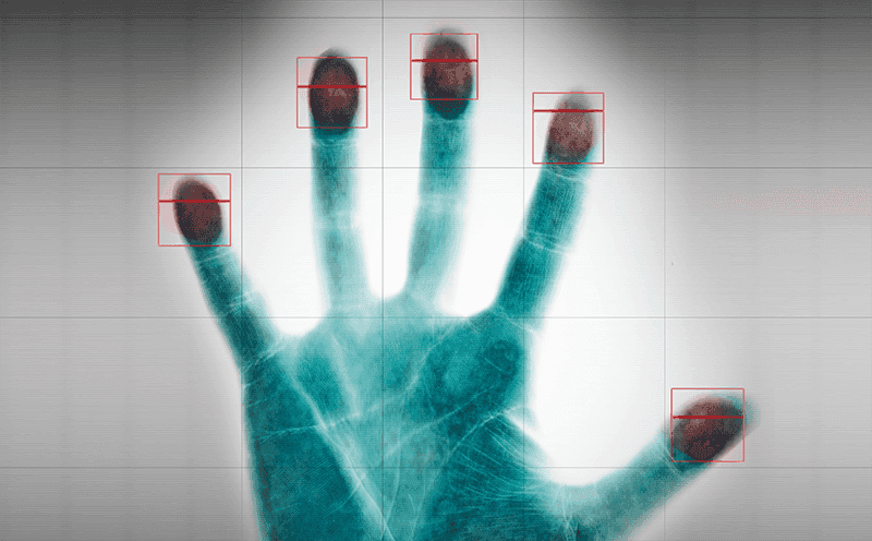 Hand leaving fingerprints on glass