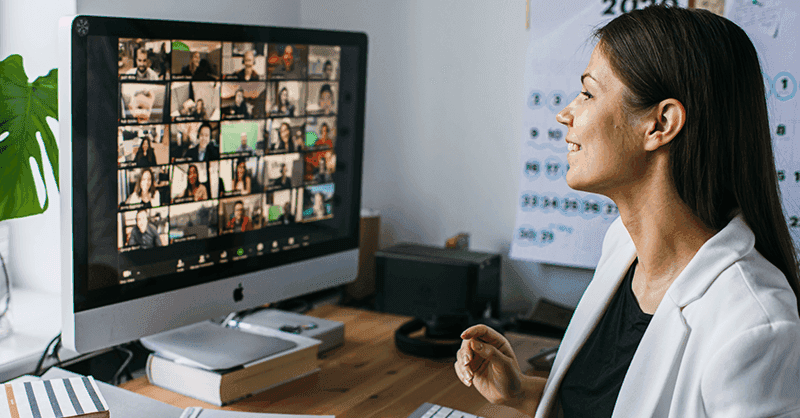 Woman working at home participating in a video conference call